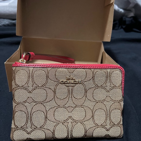 Coach Handbags - Coach Wristlet in Khaki and Red tags still on